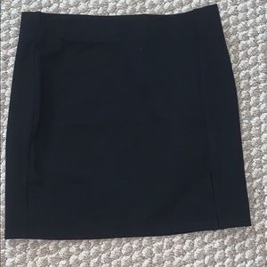 black tight mini skirt with slit